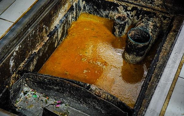 procrastinating on grease trap cleaning can result in foul odors, sanitation issues, and pricey repairs